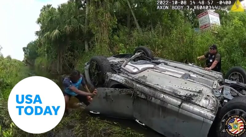 Amazon driver and deputies come to aid of people trapped in car | USA TODAY